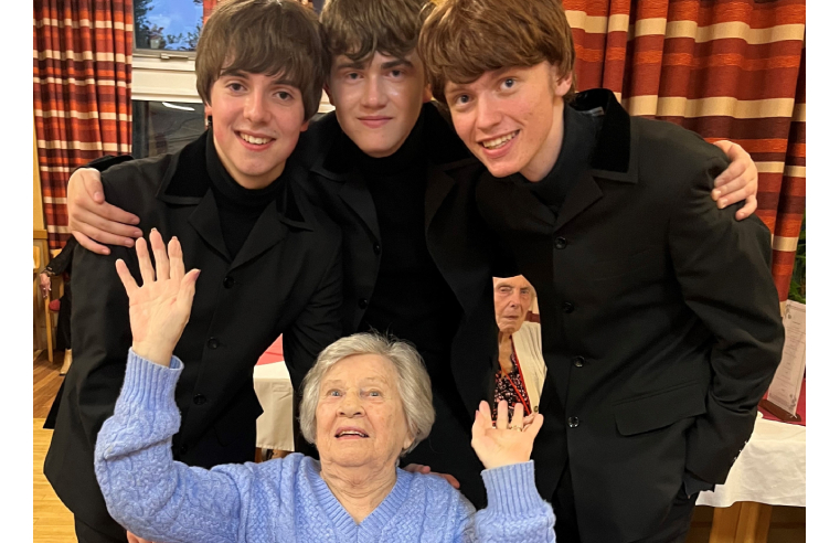 Resident Stevie at RMBI Care Co. Home Prince George Duke of Kent Court, in Chislehurst, with the Liverpool Lads, a Beatles tribute band.